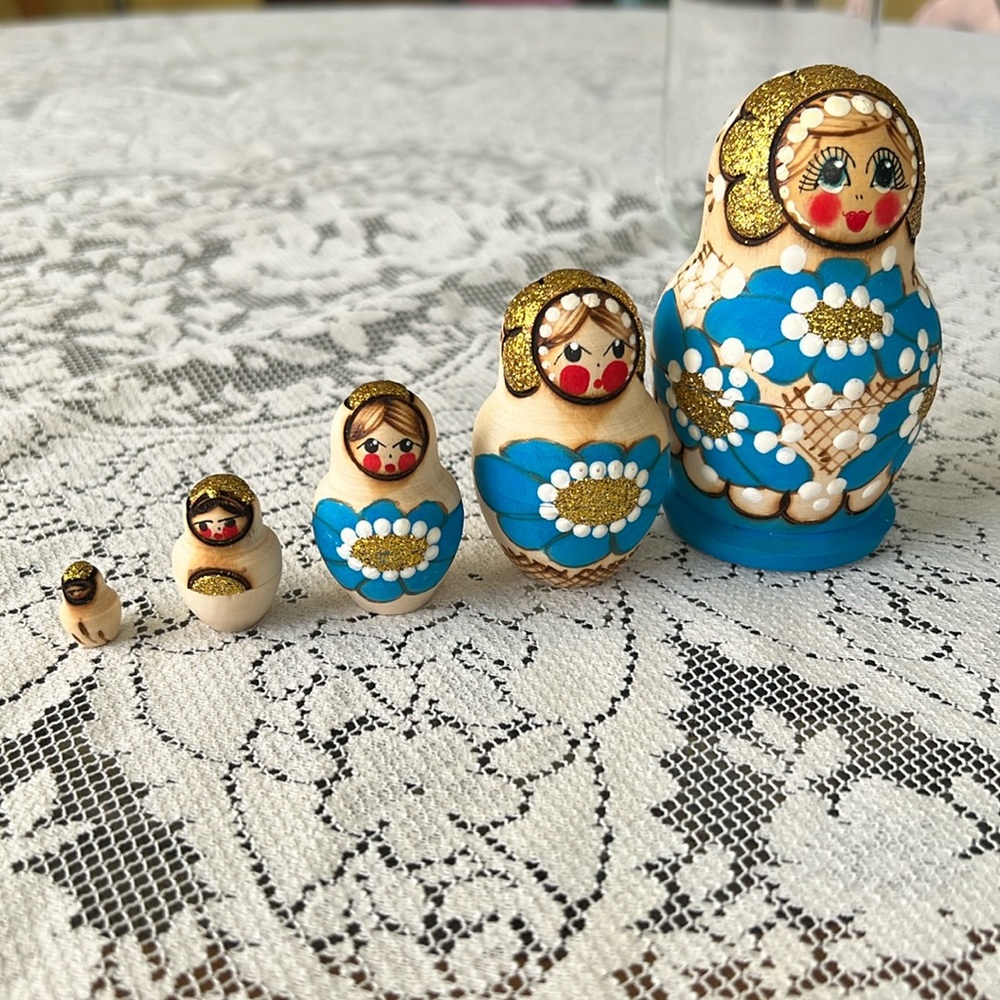 Five Vintage Russian Wood Nesting Dolls the big one 3 and a half inches.